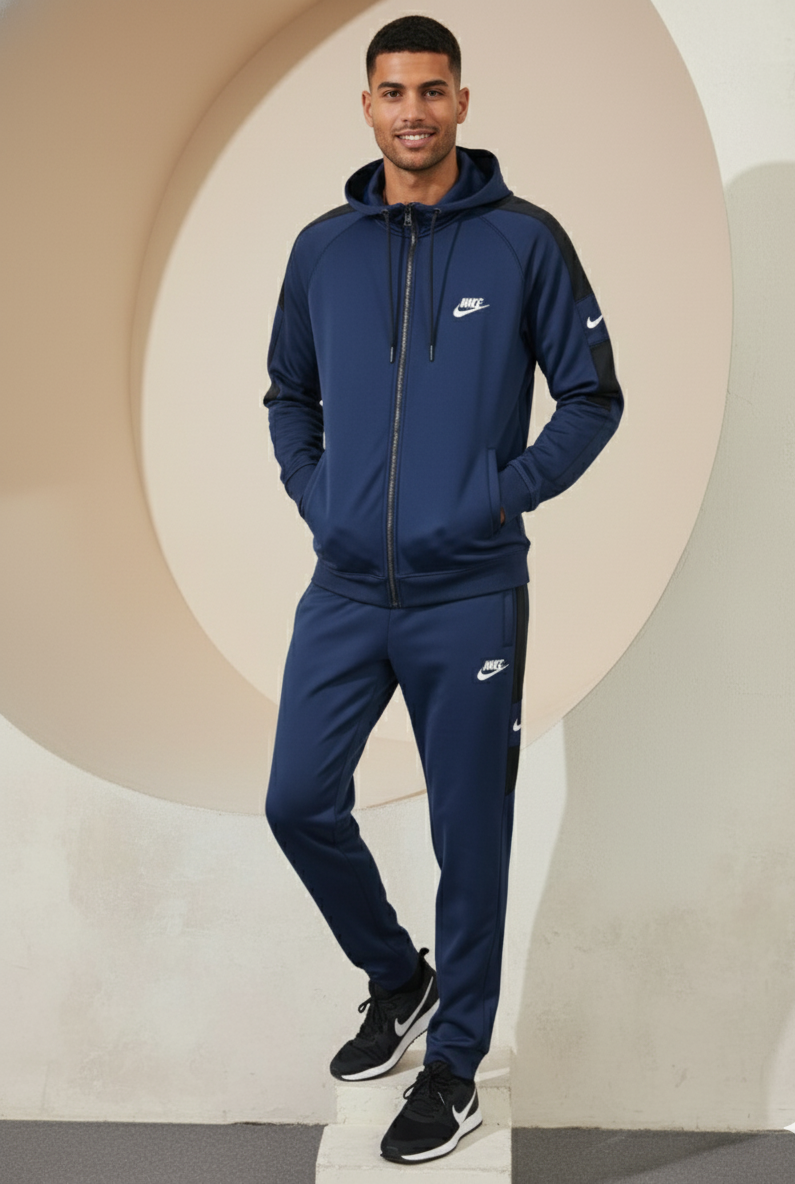 Nike Interlock Polyester Fleece Tracksuit Navy with black panels worn by model